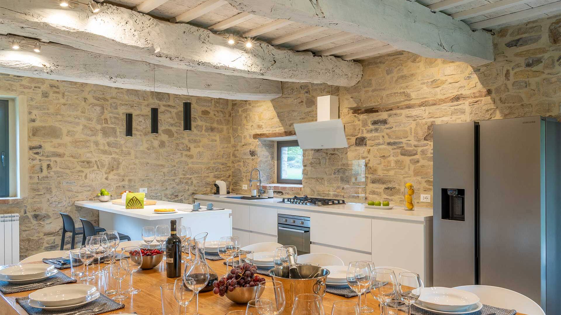 fully equipped kitchen with dining table 